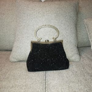 Evening bag, black beaded, metal fixtures